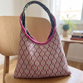 Sac à main réversible en tissus d'ameublement vert et rose